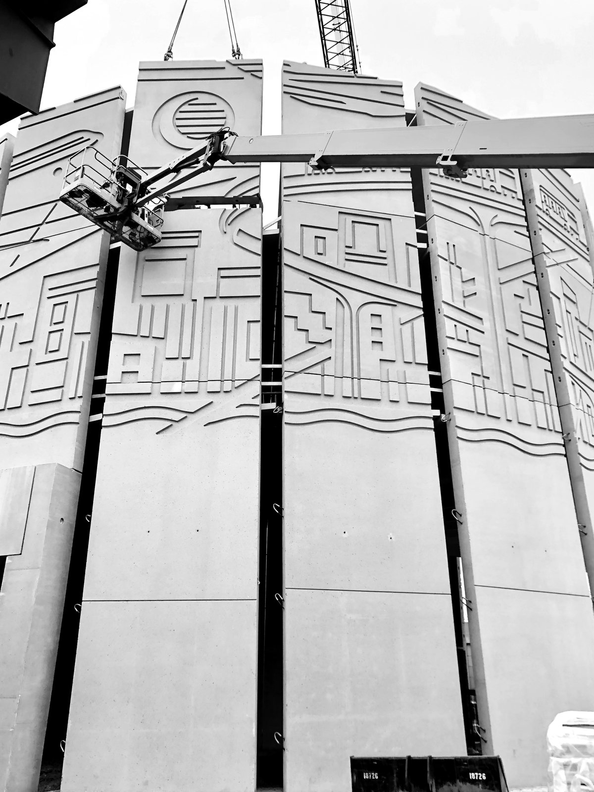 Architectural precast concrete panels lifted into place